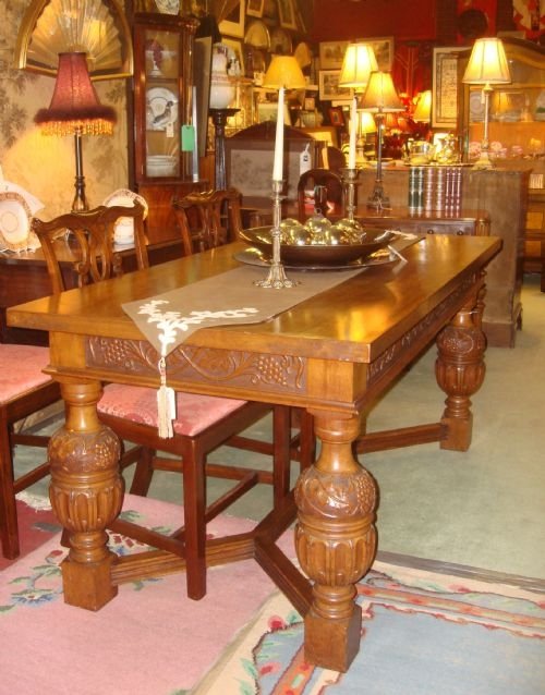 early 20th century unique walnut refectory table with beautifully carved frame