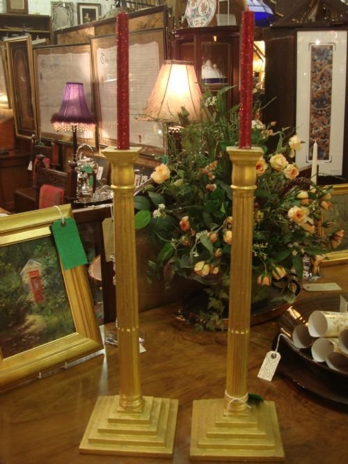 lovely pair of tall and imposing corinthian column gilt wood candlesticks