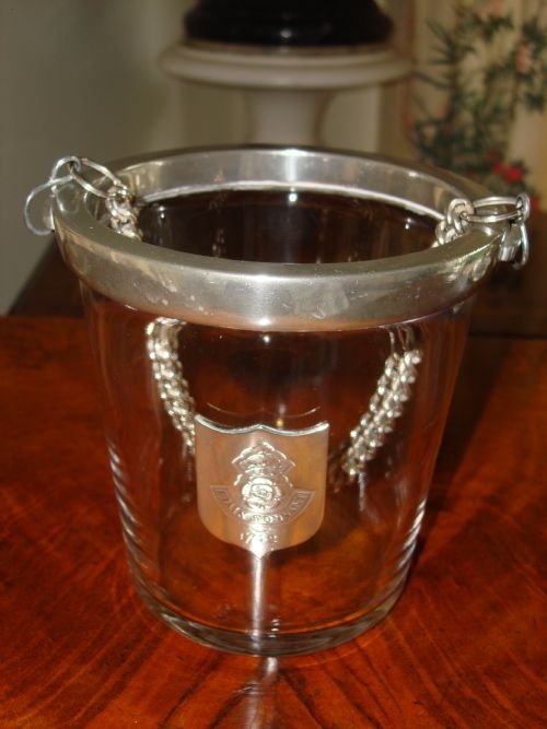 polished metal and glass ice bucket or wine cooler