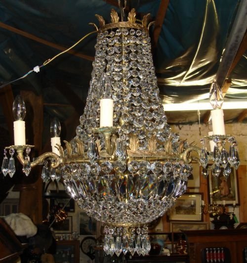 early 20th century elegant large french gilt brass and crystal 12 light chandelier with interesting provenance