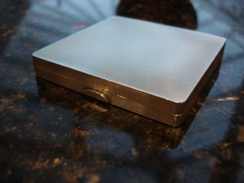 large english hallmarked solid silver square and elegant engraved compact by famous makers mappin and webb