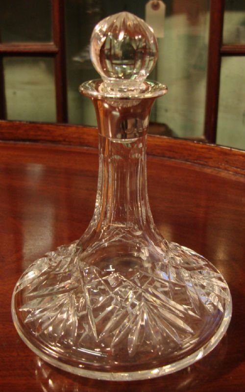 lovely petite solid silver and cut glass ships decanter made by famous makers a e jones