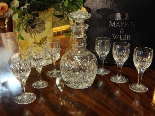 lovely famous stuart crystal decanter set and stand retailed by renowned retailers mappin and webb