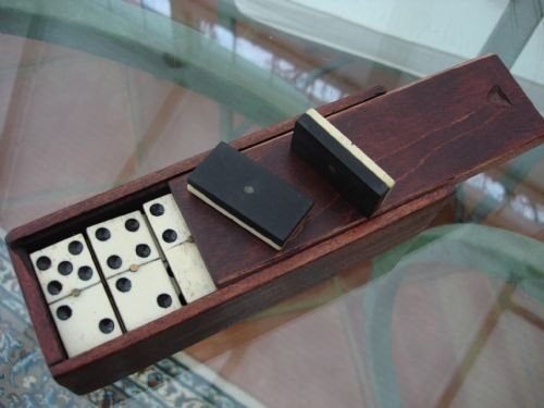 very nice bone and ebony set of dominoes in mahogany slide top box