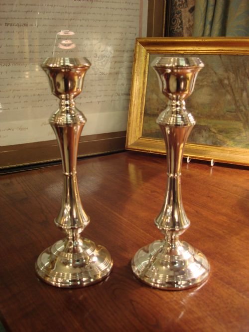 lovely tall english hallmarked sterling silver pair of candlesticks with classic design