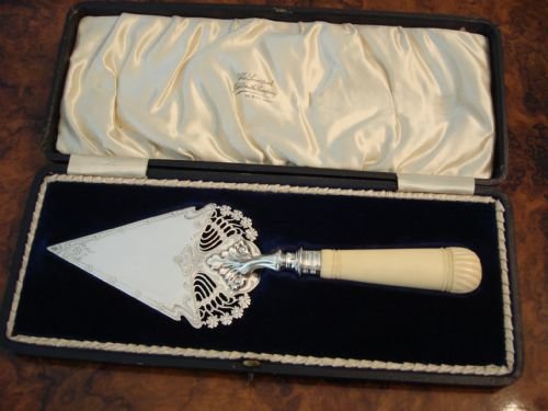 sheffield 1908 very rare and unusual sterling silver trowel in art nouveau pierced design with carved handle by famed maker harry atkin