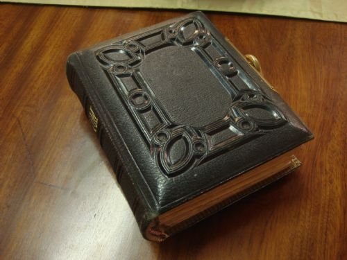 dated 1882 victorian embossed leather picture album with gilt metal clasp and embellishment