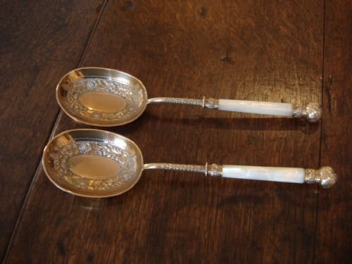 victorian pair of gilt metal and mother of pearl serving spoons by famous makers martin and hall
