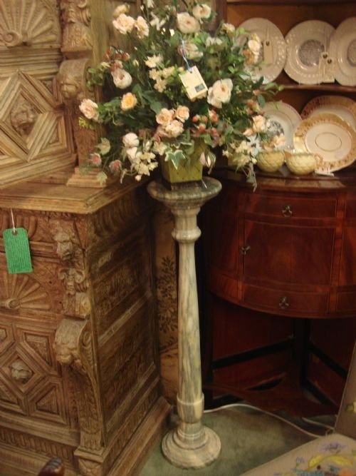 slender and classic carved marble column or pillar