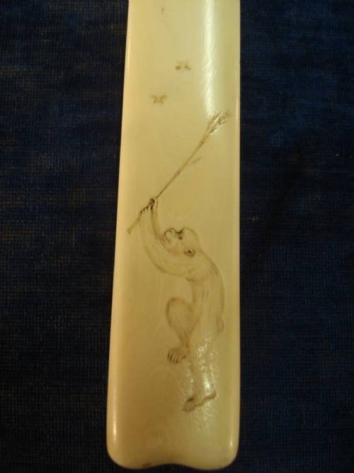 19thc superb ivory curved and signed japanese letter knife with charming engravings of monkeys
