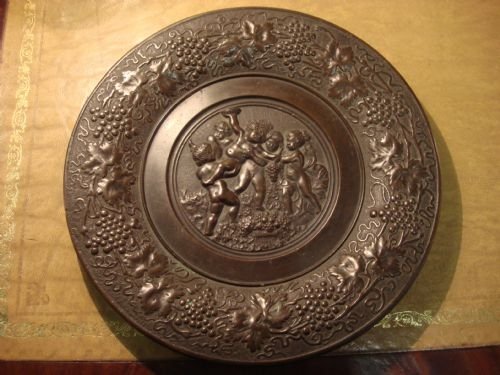 19thc cast bronze plate with baccanalian design