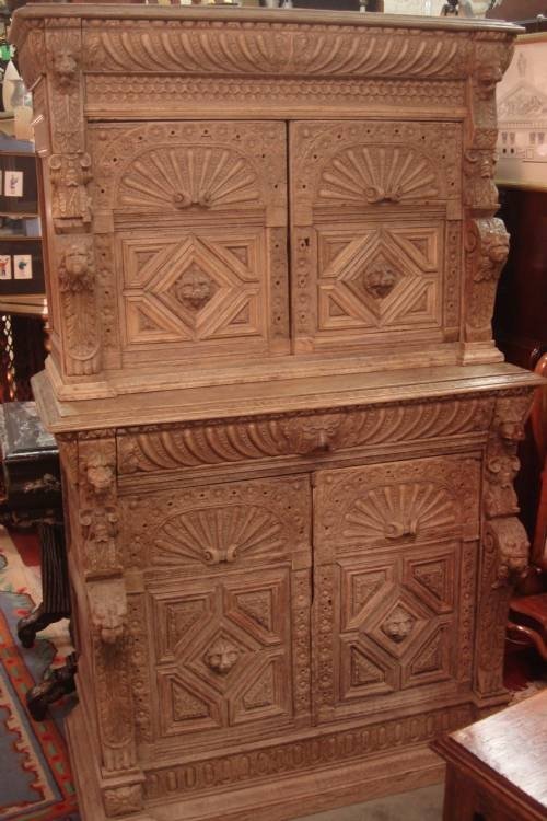 19th century continental wonderful pale solid oak fancifully carved cupboard