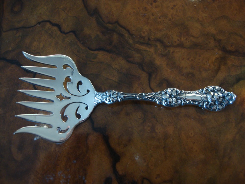 exquisite sterling silver sardine serving fork in the old orange blossom pattern by alvin